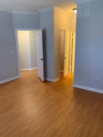 a view of a room with a hallway