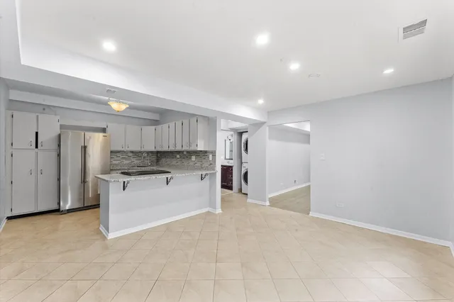 a view of a kitchen with a sink