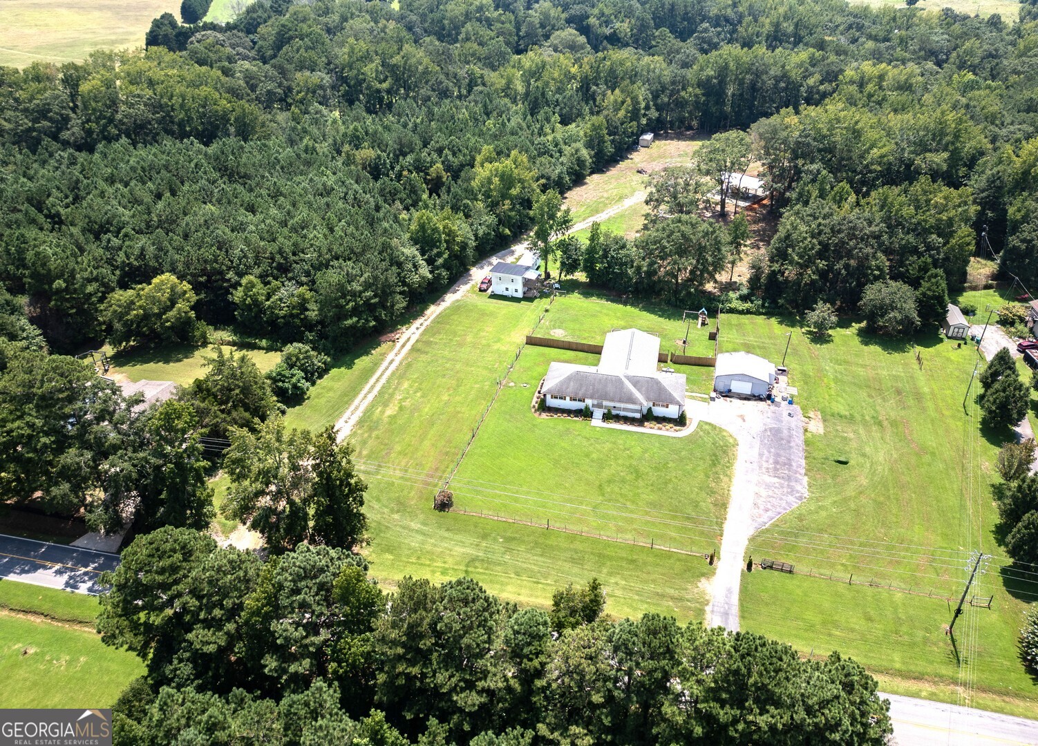 an aerial view of a swimming pool
