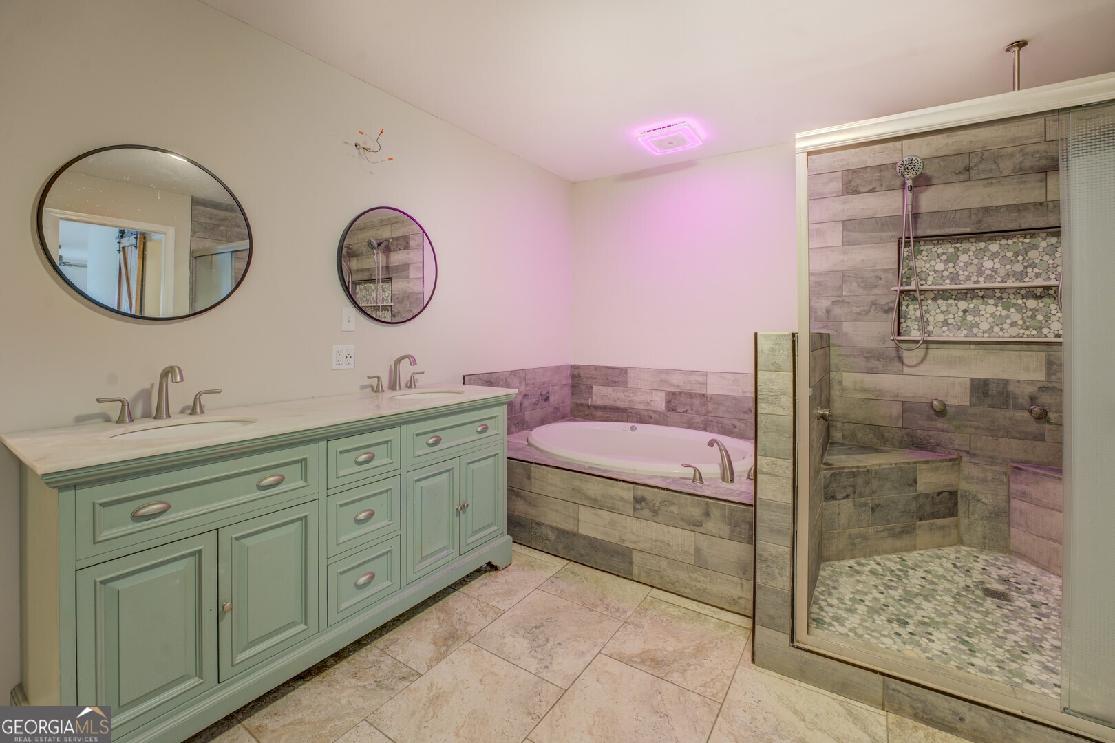 635 Jackson Lake Road Mansfield, GA 30055 - Photo 30 of 68 a bathroom with a double vanity sink mirror and shower