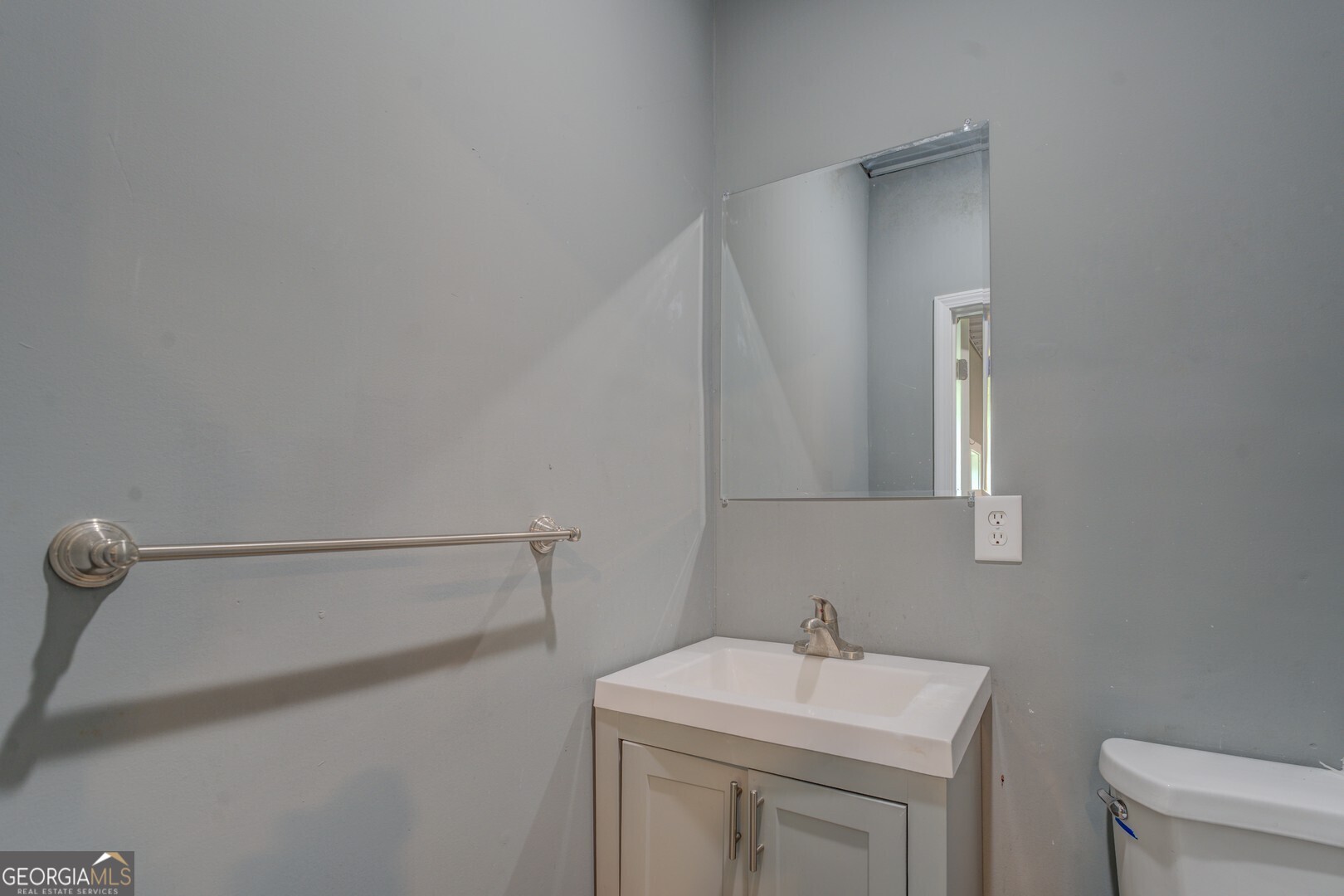 635 Jackson Lake Road Mansfield, GA 30055 - Photo 54 of 68 a bathroom with a sink and a toilet