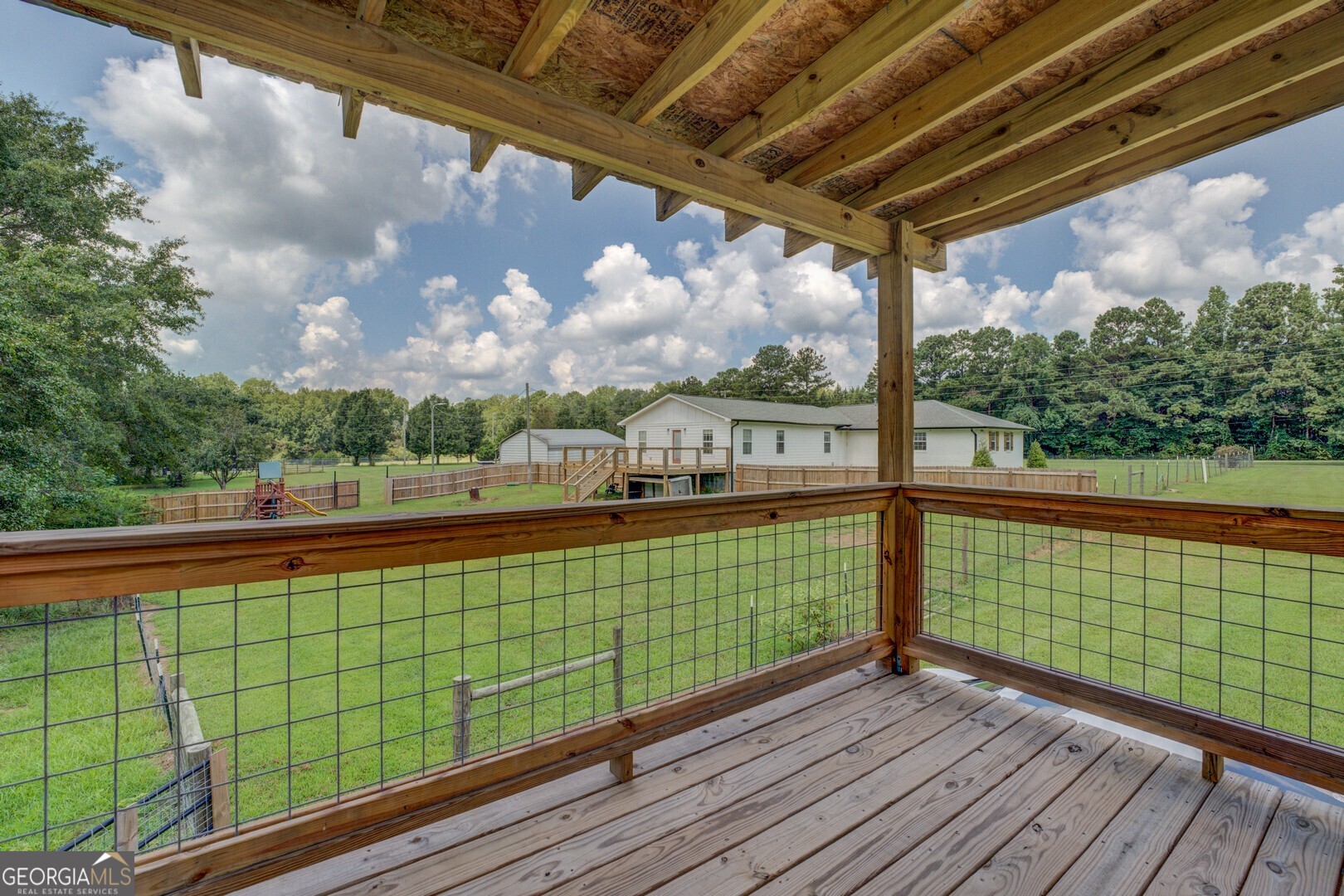 635 Jackson Lake Road Mansfield, GA 30055 - Photo 56 of 68 a view of a balcony with city view