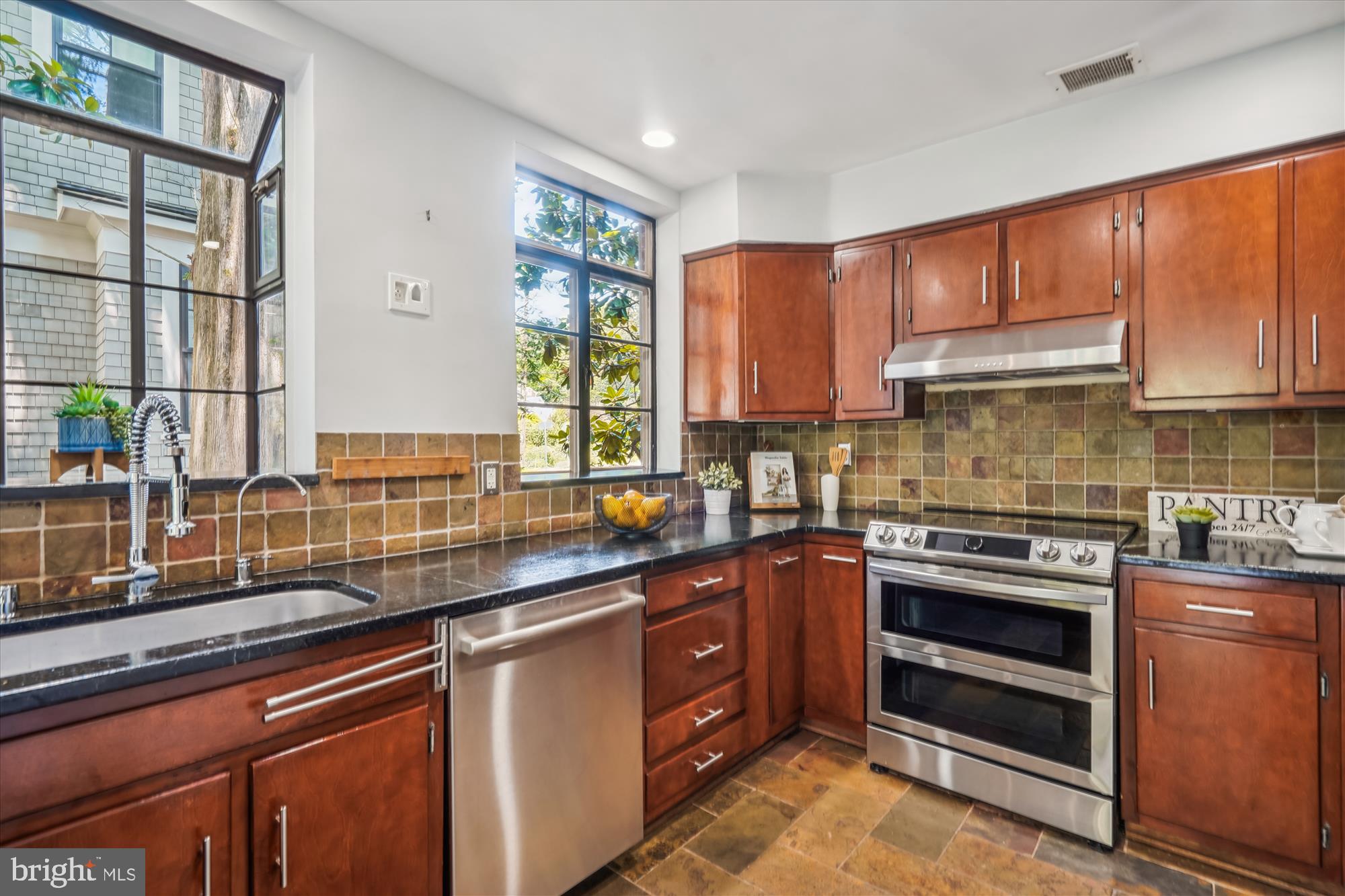 6424 Ridge Drive Bethesda, MD 20816 - Photo 12 of 69 Stone countertops, Stainless appliances