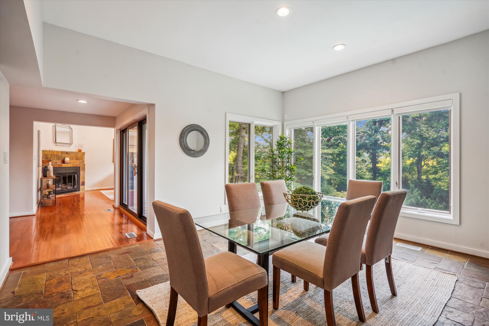 6424 Ridge Drive Bethesda, MD 20816 - Photo 16 of 69 Stone flooring with floor-to-ceiling windows