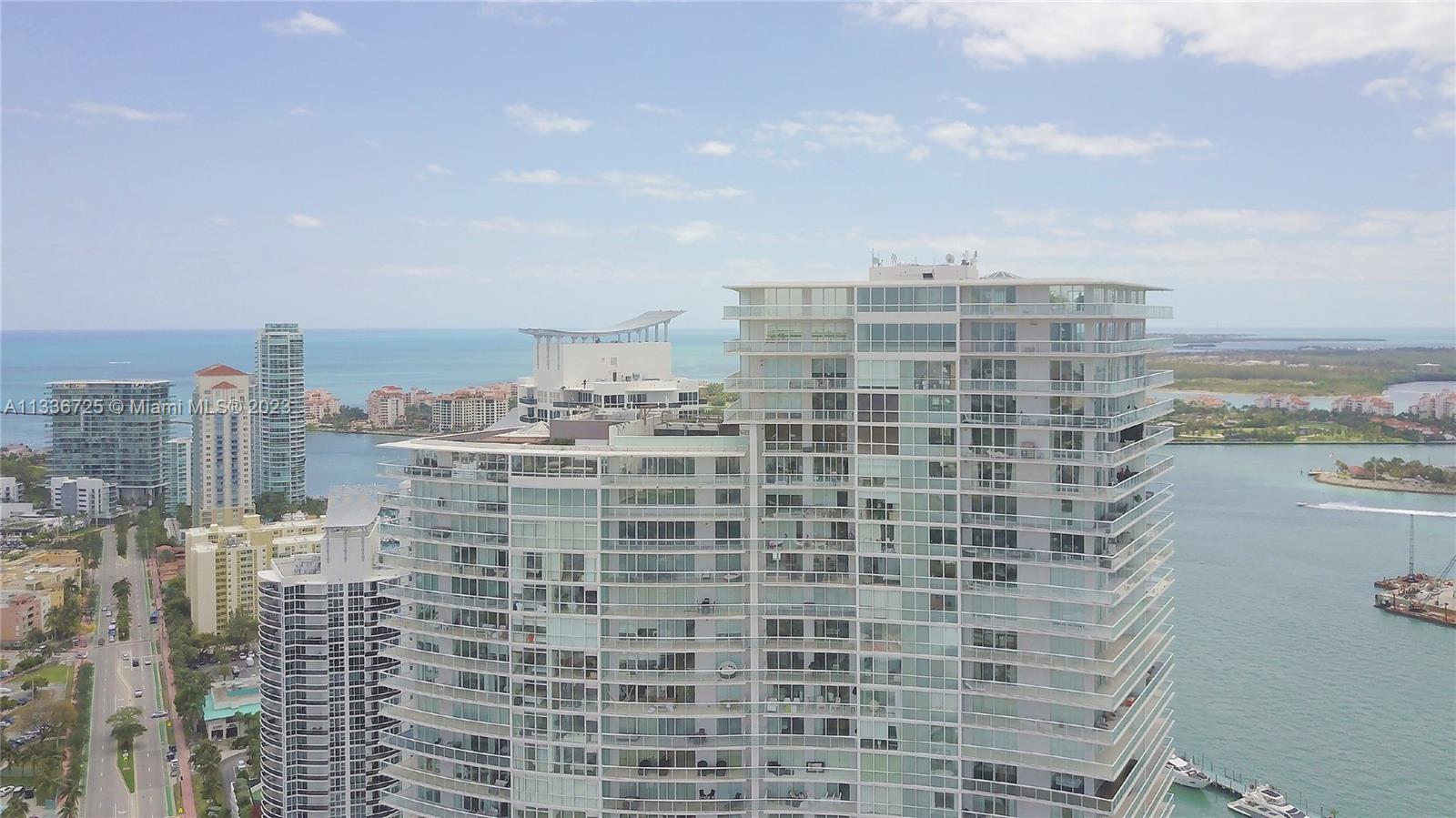 450 Alton Road, Unit 2006 Miami Beach, FL 33139 - Photo 29 of 34 a view of a city with tall buildings and a city view