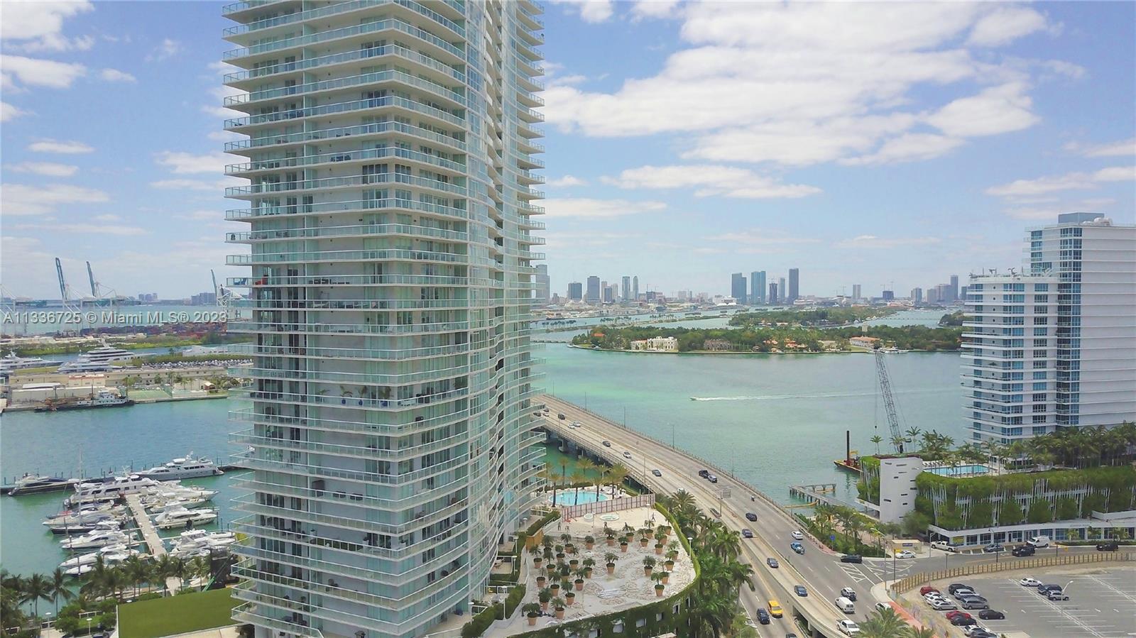450 Alton Road, Unit 2006 Miami Beach, FL 33139 - Photo 32 of 34 a view of a lake with a city skyline