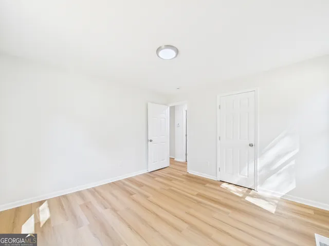 an empty room with windows