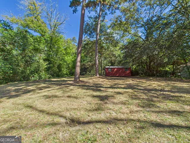 a fire hydrant in the middle of a field