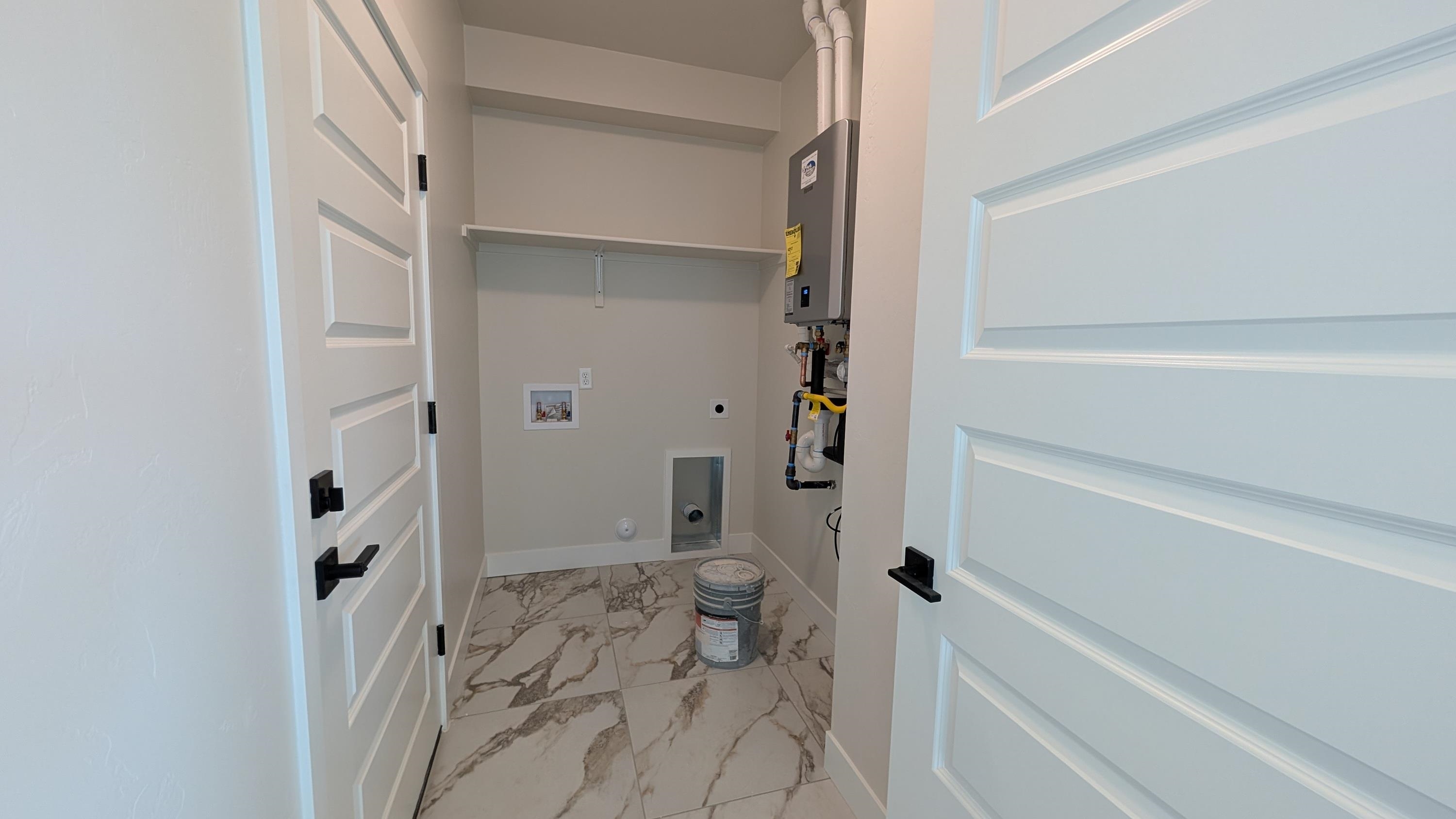 2463 Revere Road, Unit A Grand Junction, CO 81505 - Photo 11 of 13 a bathroom with a shower and a toilet