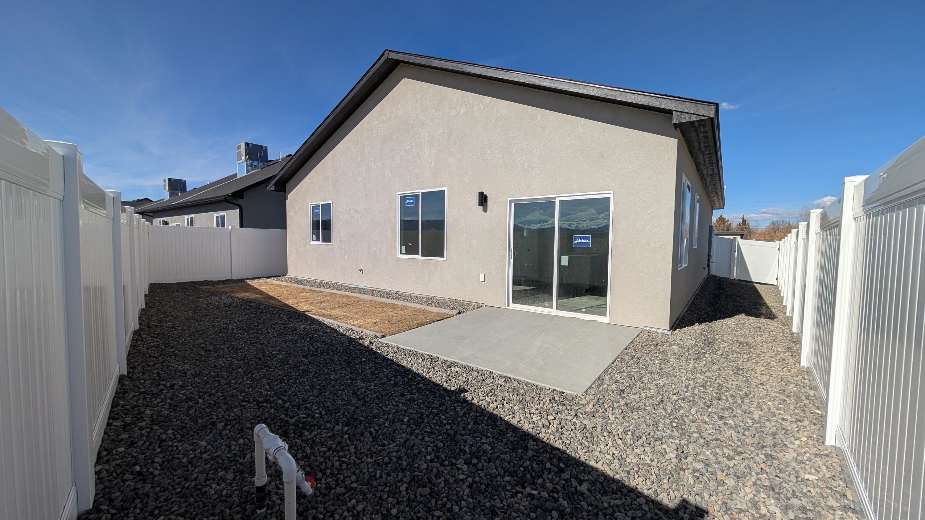 2463 Revere Road, Unit A Grand Junction, CO 81505 - Photo 2 of 13 a house view with a backyard