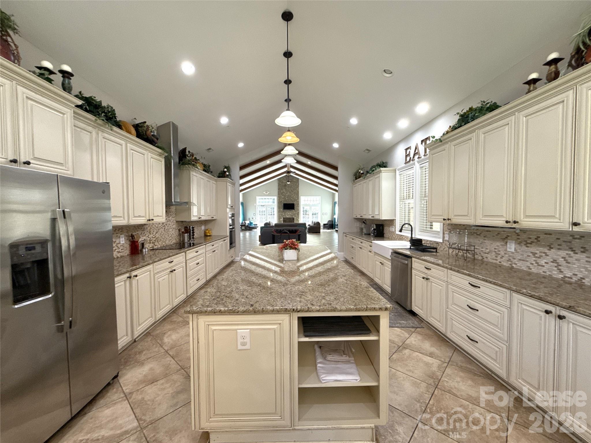 13931 Thompson Road Charlotte, NC 28227 - Photo 12 of 43 a large kitchen with granite countertop lots of counter top space