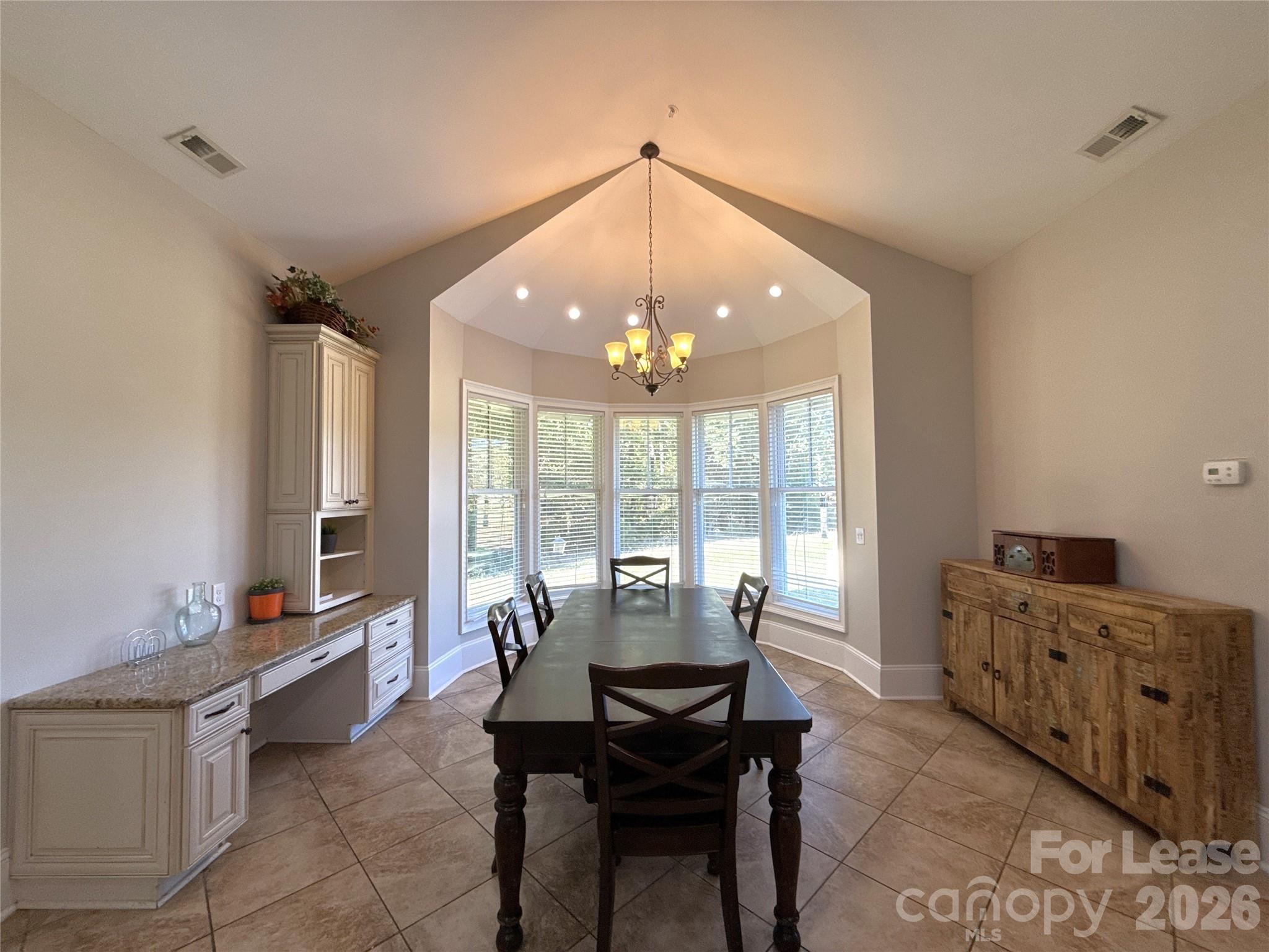 13931 Thompson Road Charlotte, NC 28227 - Photo 13 of 43 a view of a dining room with furniture window and outside view