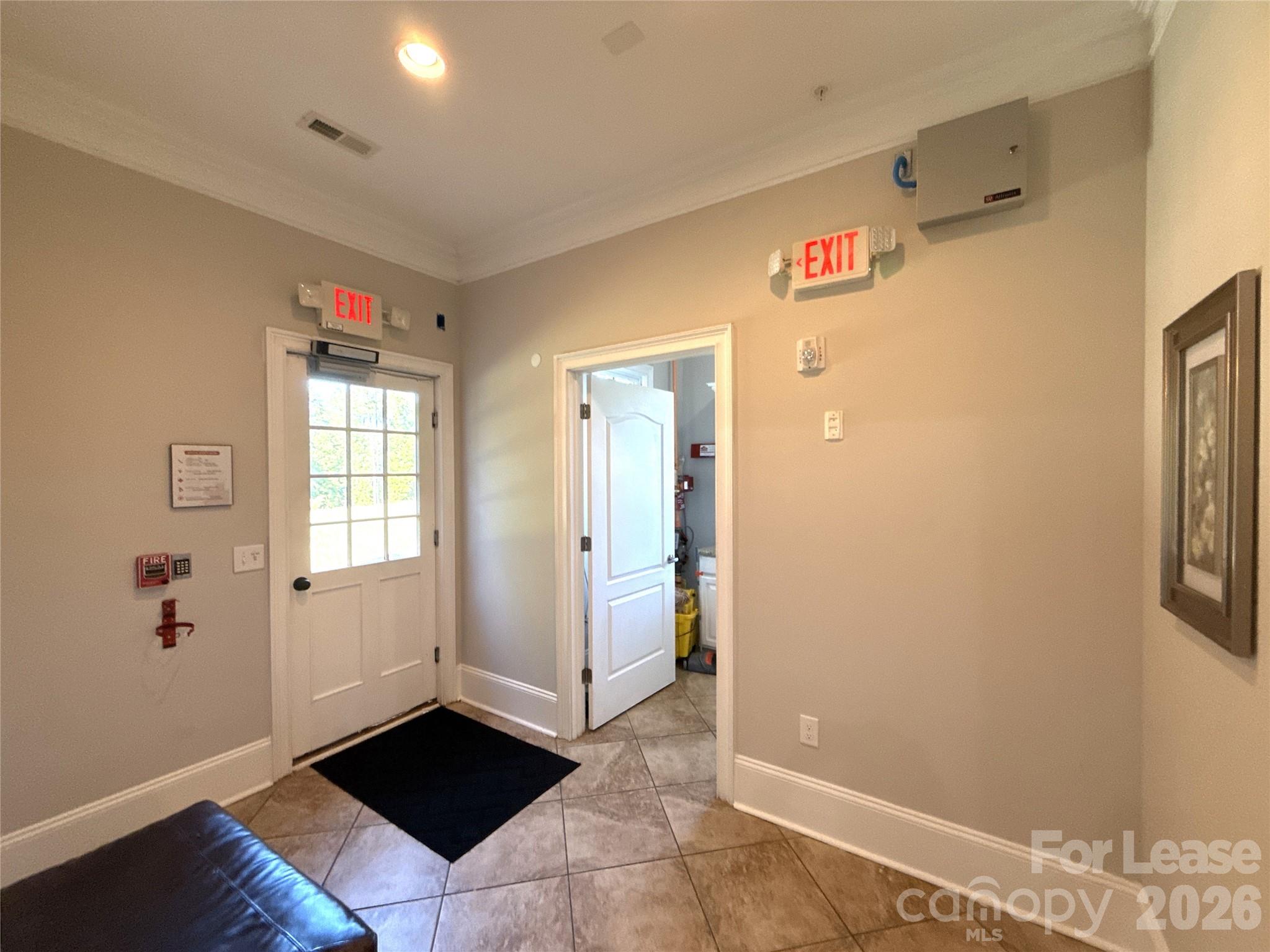 13931 Thompson Road Charlotte, NC 28227 - Photo 17 of 43 a view of a livingroom with wooden floor and cabinet