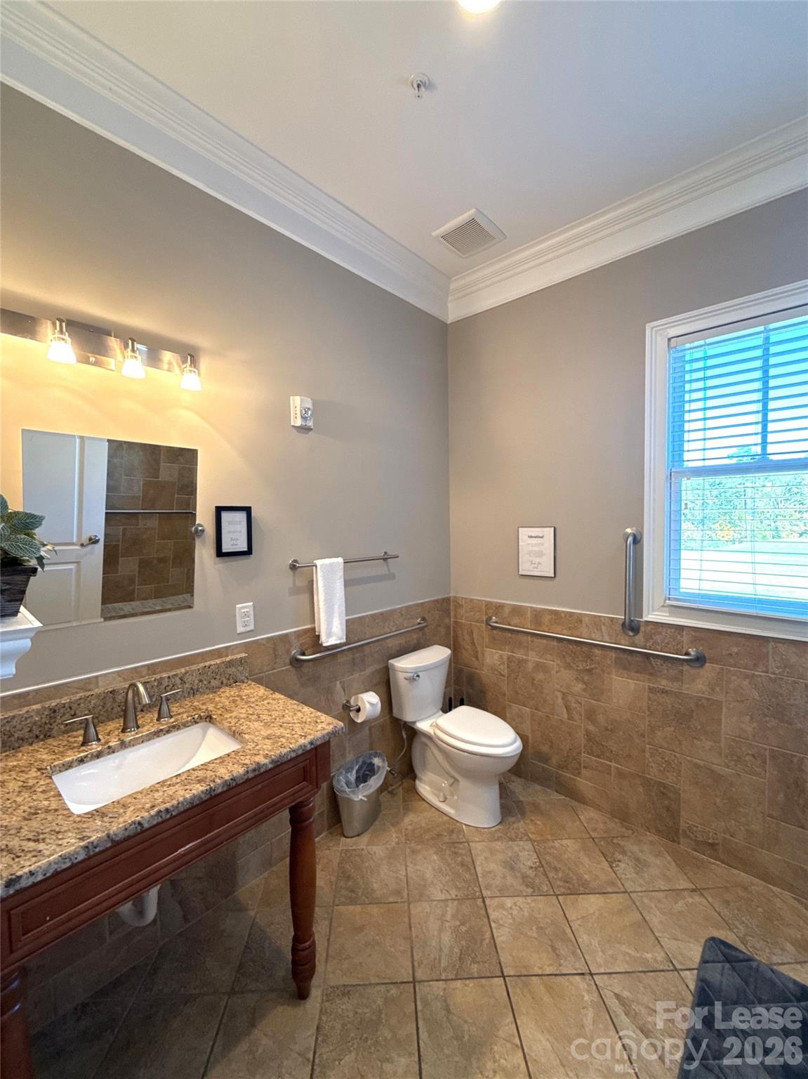 13931 Thompson Road Charlotte, NC 28227 - Photo 21 of 43 a bathroom with a sink and a mirror