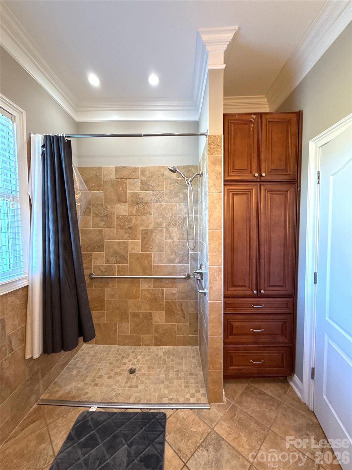 13931 Thompson Road Charlotte, NC 28227 - Photo 22 of 43 a bathroom with a shower