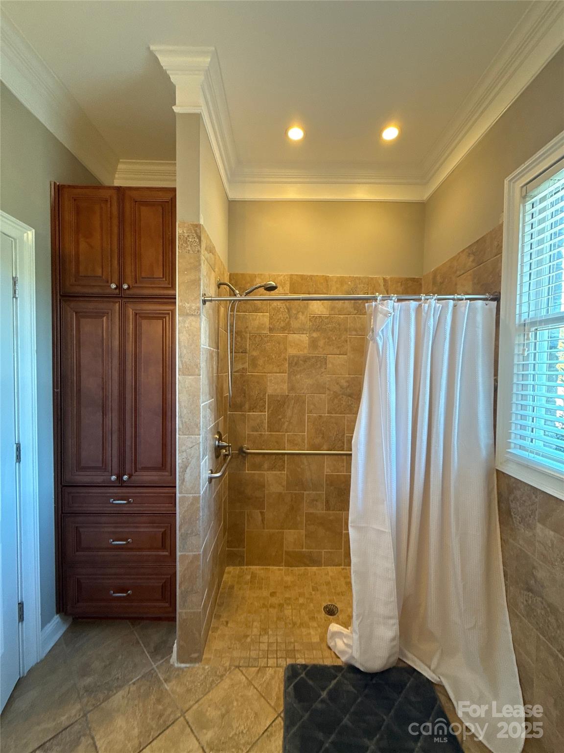 13931 Thompson Road Charlotte, NC 28227 - Photo 23 of 41 a bathroom with a shower
