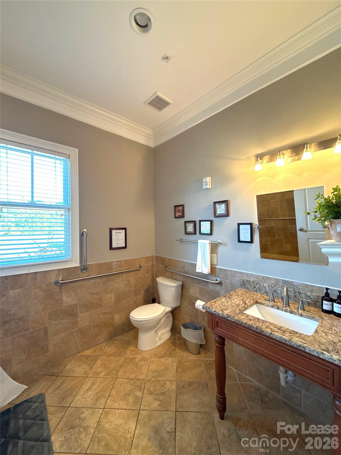 13931 Thompson Road Charlotte, NC 28227 - Photo 24 of 43 a bathroom with a granite countertop sink and a mirror