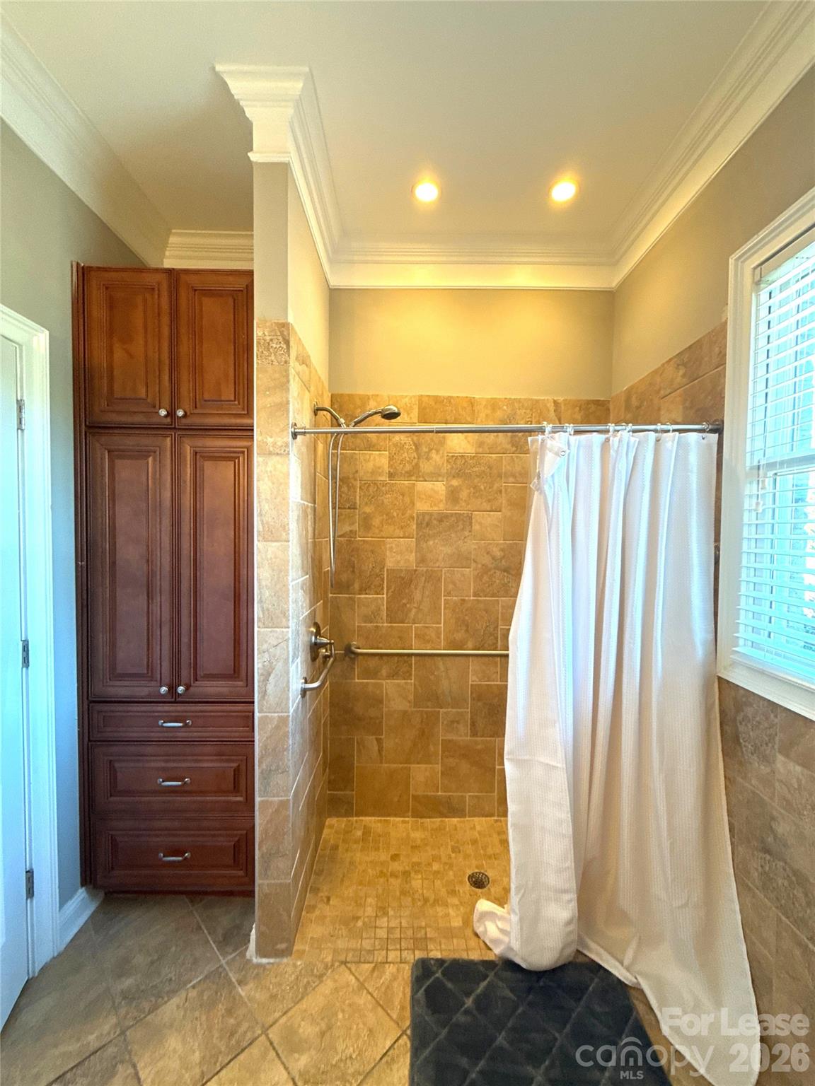 13931 Thompson Road Charlotte, NC 28227 - Photo 25 of 43 a bathroom with a shower