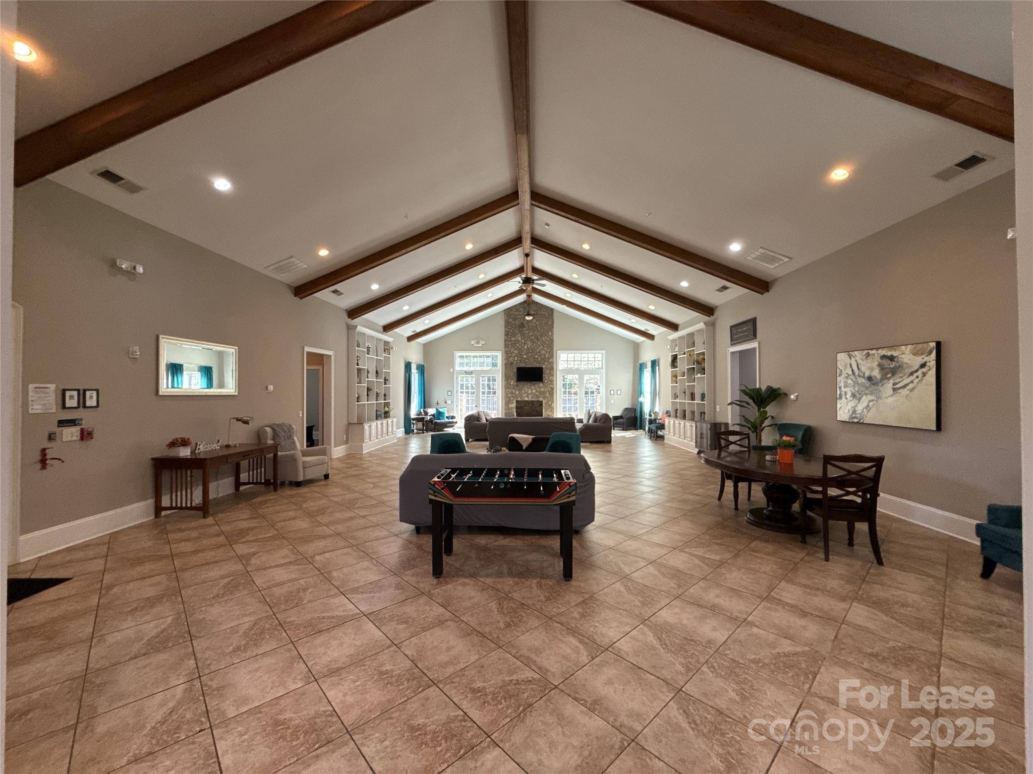 13931 Thompson Road Charlotte, NC 28227 - Photo 6 of 41 a living room with furniture and a chandelier