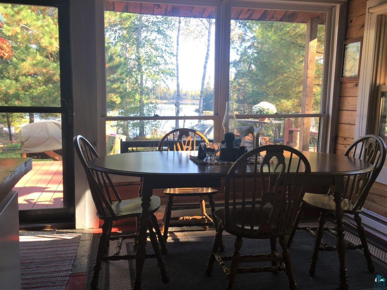 3420 Dewees Road Babbitt, MN 55706 - Photo 24 of 58 Sunroom featuring a water view