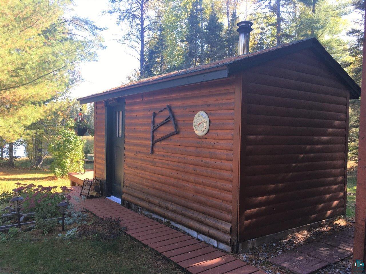 3420 Dewees Road Babbitt, MN 55706 - Photo 31 of 58 Sauna is connected to other structures by boardwalk.