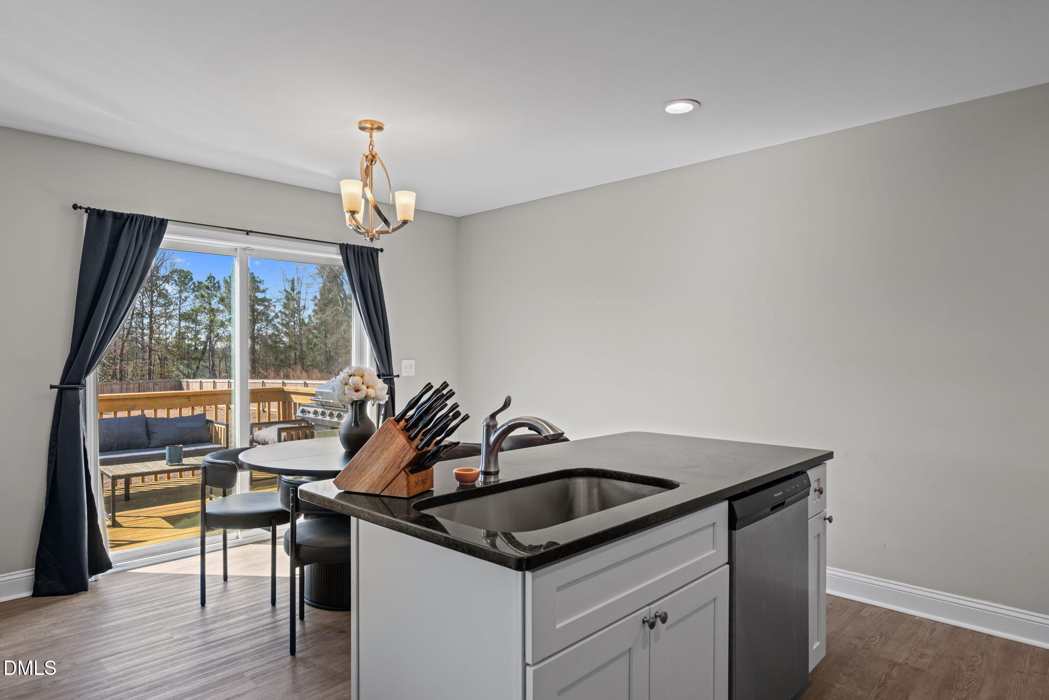 904 Allstar Avenue Cameron, NC 28326 - Photo 12 of 34 a kitchen with a sink and a window