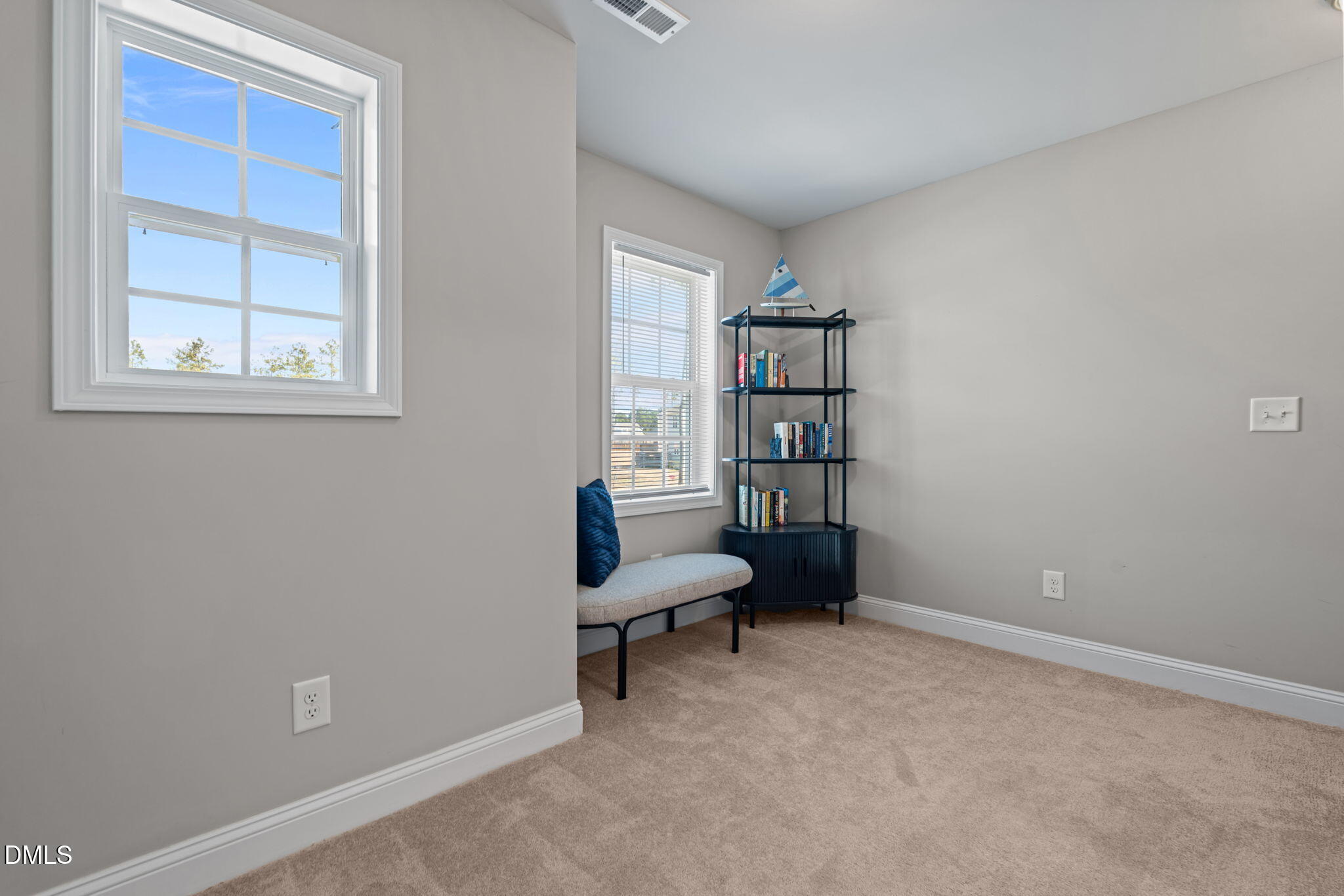 904 Allstar Avenue Cameron, NC 28326 - Photo 15 of 34 a view of a workspace with furniture and a window