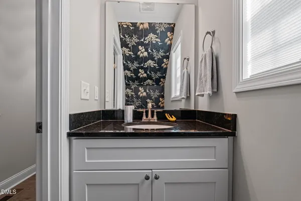 a close view of sink and mirror