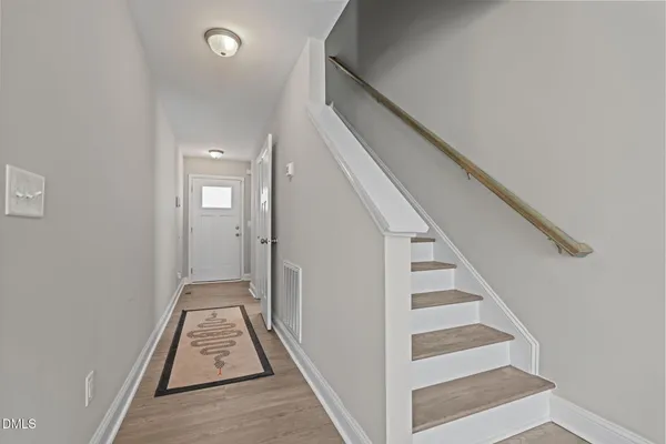 a view of staircase with white walls and white walls