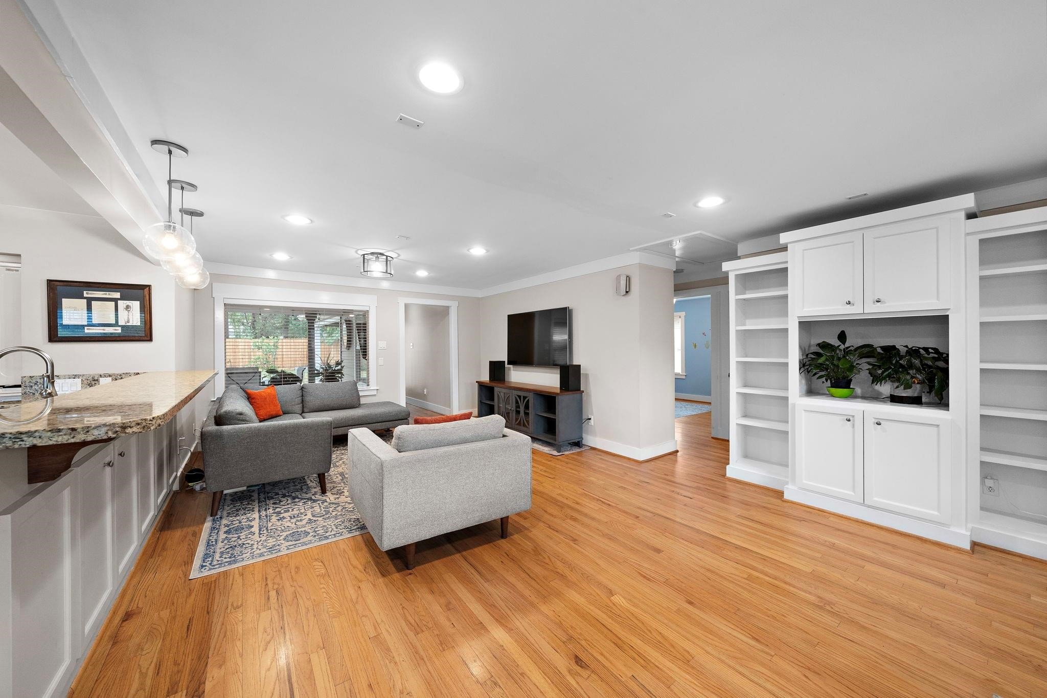 954 West 41st Street Houston, TX 77018 - Photo 9 of 19 a living room with furniture and a wooden floor