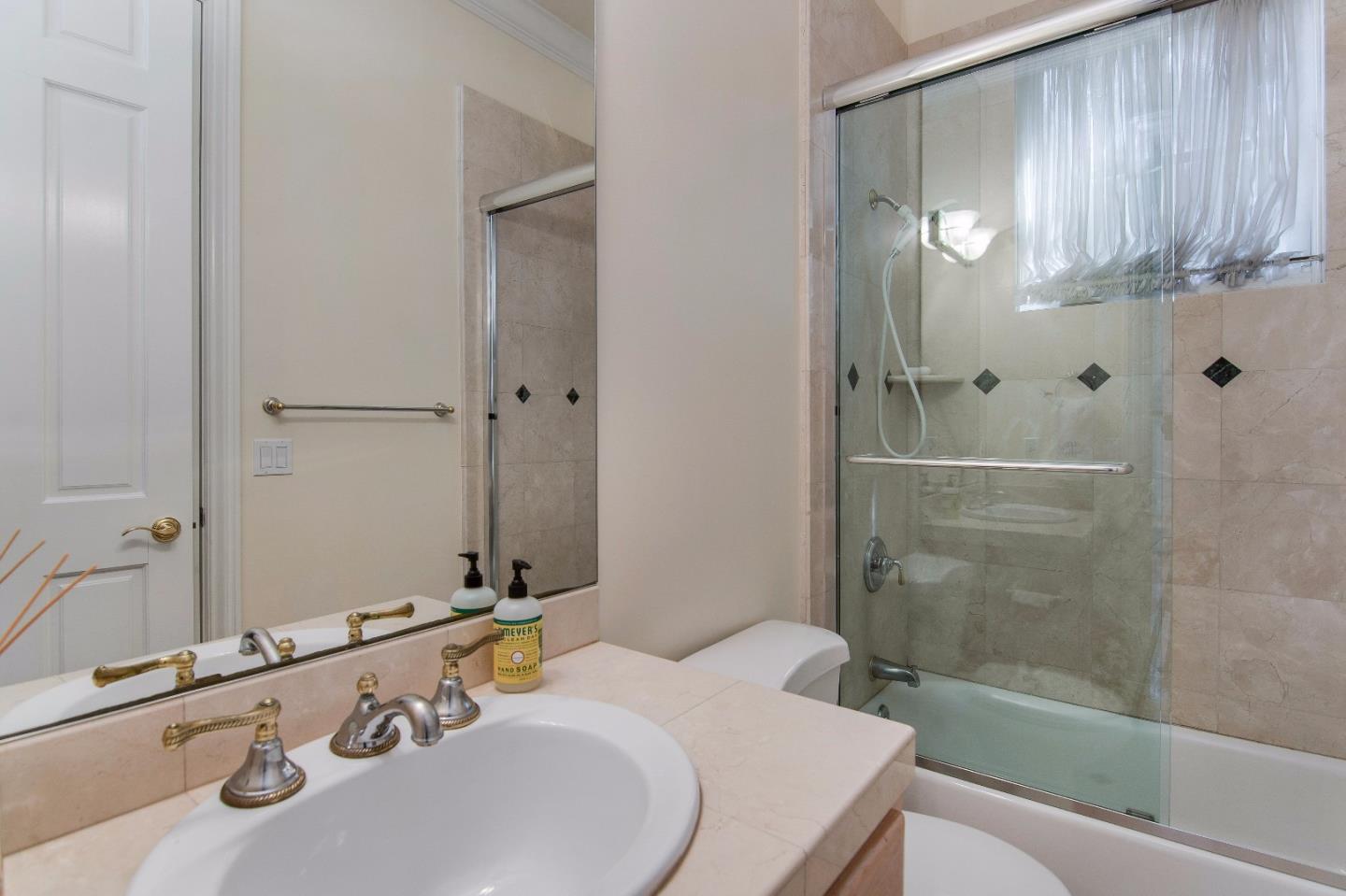 37 Valley Road Atherton, CA 94027 - Photo 14 of 26 a bathroom with a sink and a mirror