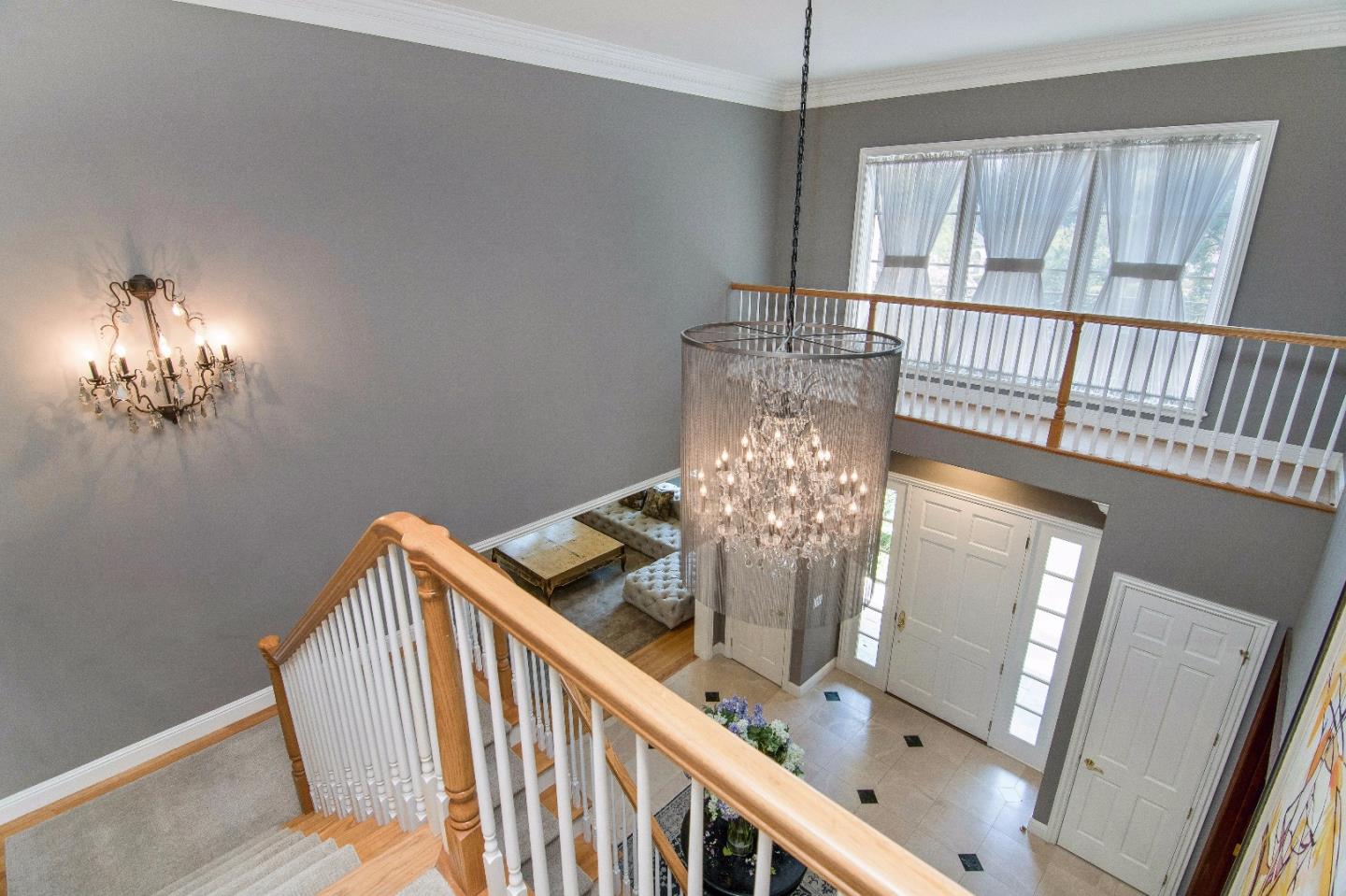 37 Valley Road Atherton, CA 94027 - Photo 15 of 26 a view of a livingroom with furniture window wooden floor and stairs