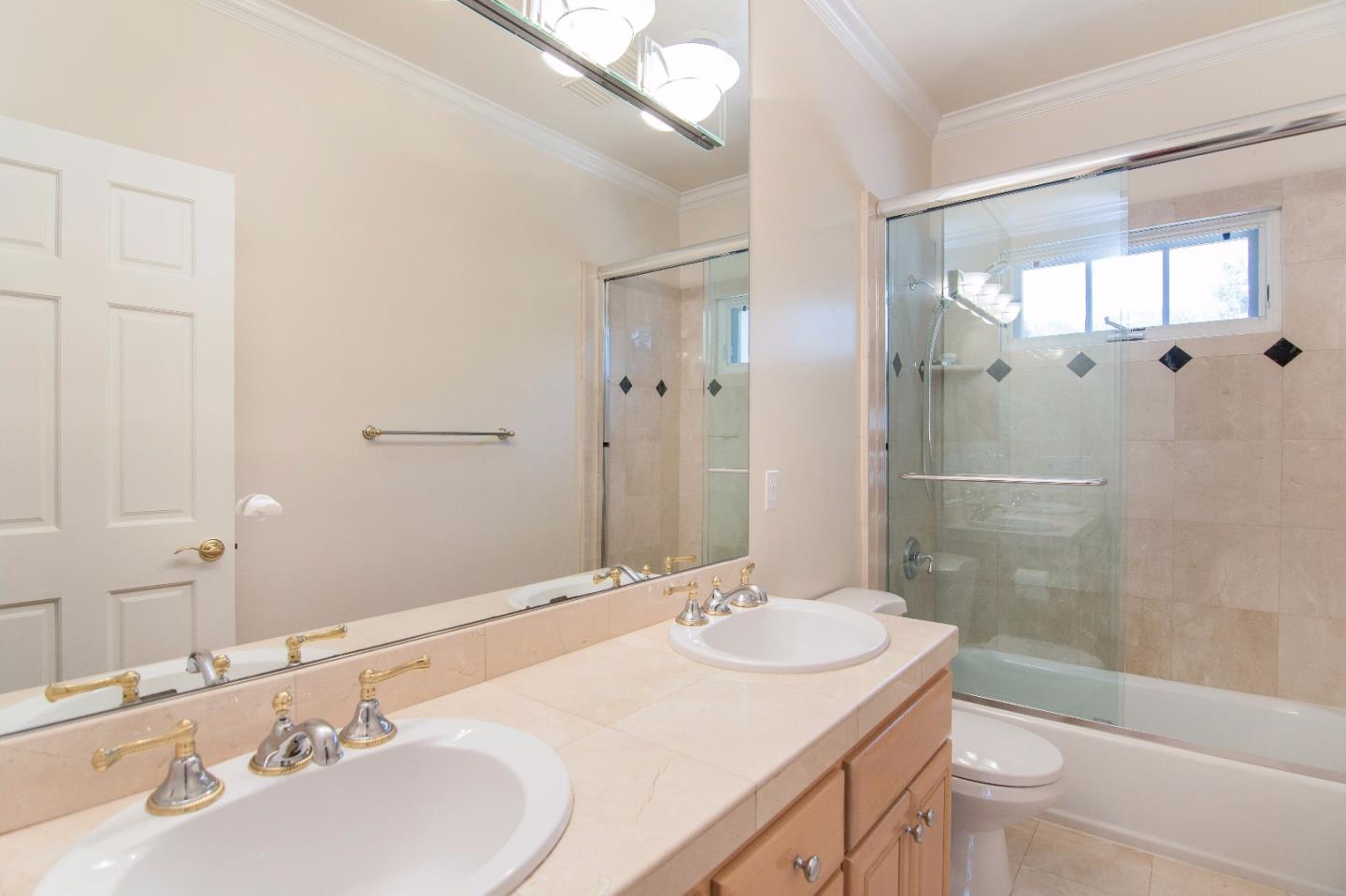 37 Valley Road Atherton, CA 94027 - Photo 18 of 26 a bathroom with a sink a toilet and shower