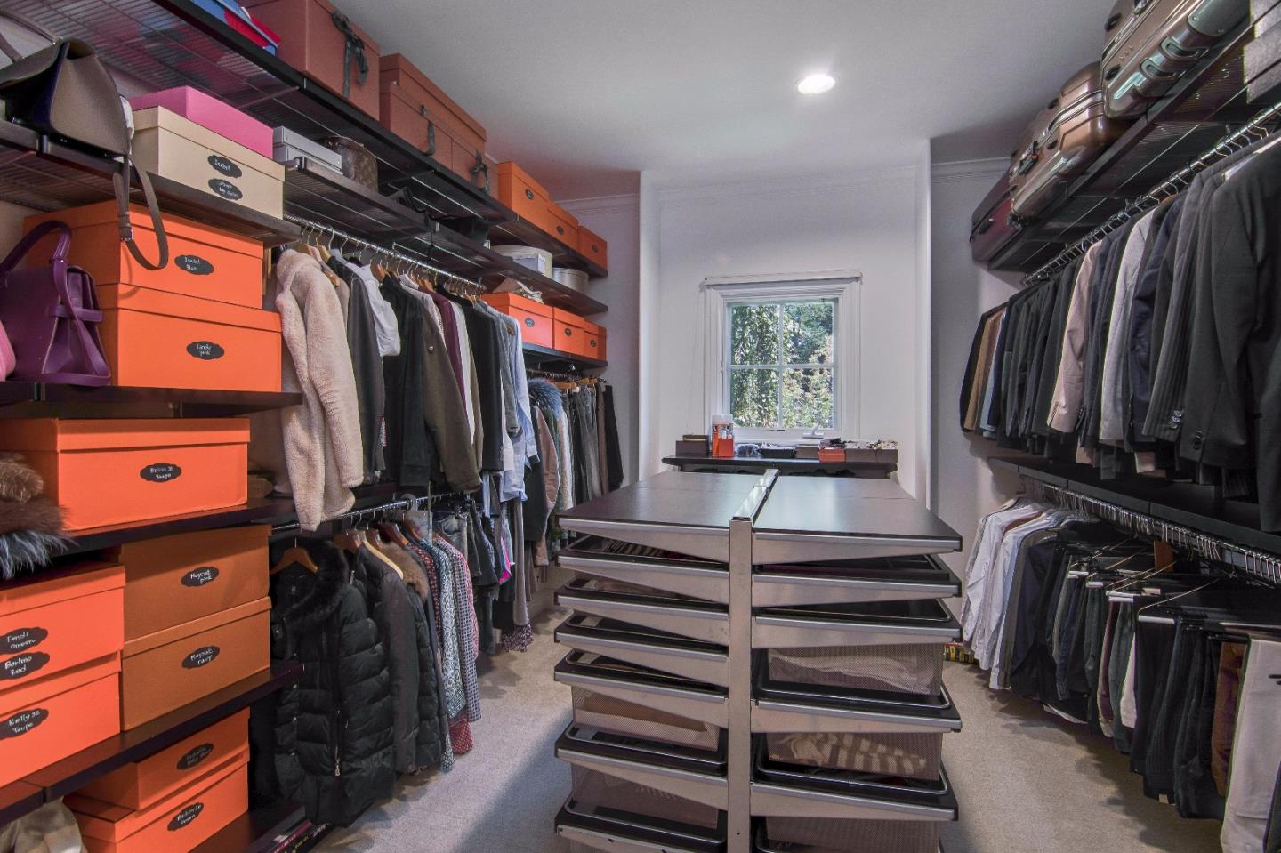 37 Valley Road Atherton, CA 94027 - Photo 21 of 26 a view of walk in closet with clothes and shoes