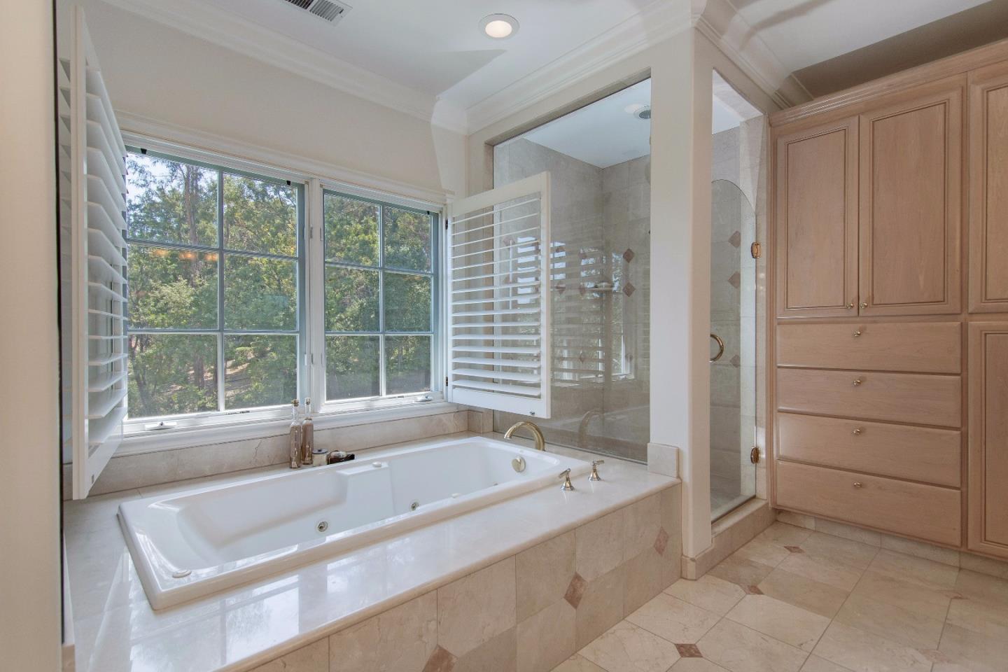37 Valley Road Atherton, CA 94027 - Photo 23 of 26 a bathroom with a tub and a sink