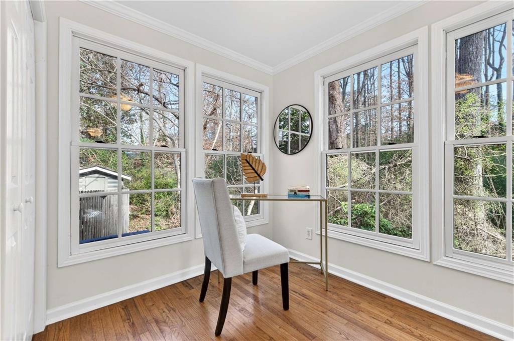 421 Emory Drive Northeast Atlanta, GA 30307 - Photo 19 of 42 a dining room with wooden floor and a window