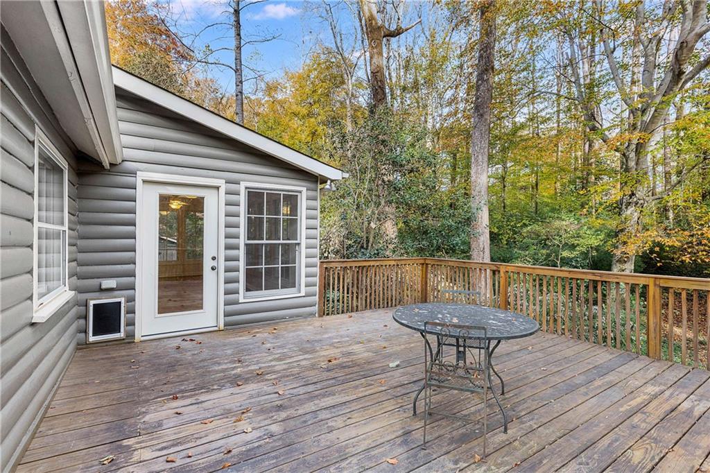 421 Emory Drive Northeast Atlanta, GA 30307 - Photo 29 of 42 a view of a roof deck with wooden floor and fence
