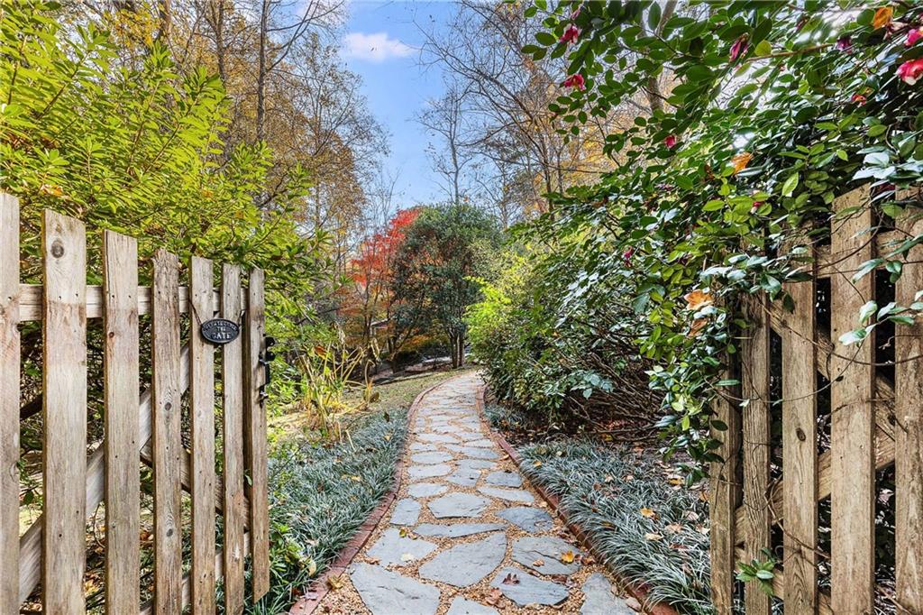 421 Emory Drive Northeast Atlanta, GA 30307 - Photo 3 of 42 a pathway of a house with a yard