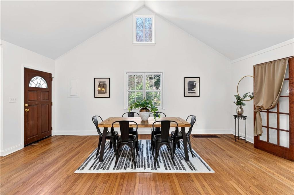 421 Emory Drive Northeast Atlanta, GA 30307 - Photo 5 of 42 a view of a dining room with furniture and wooden floor