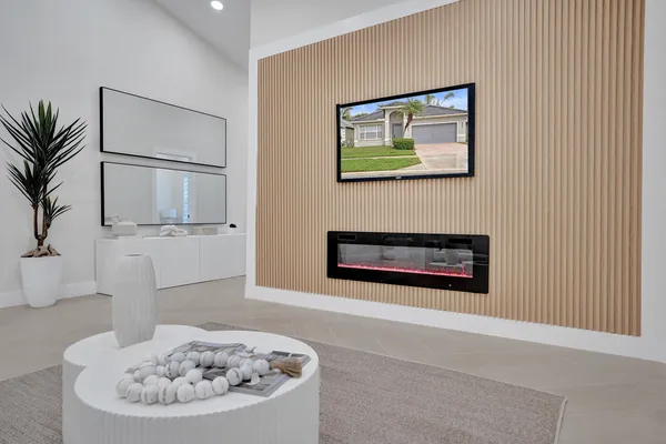 a living room with furniture and a table