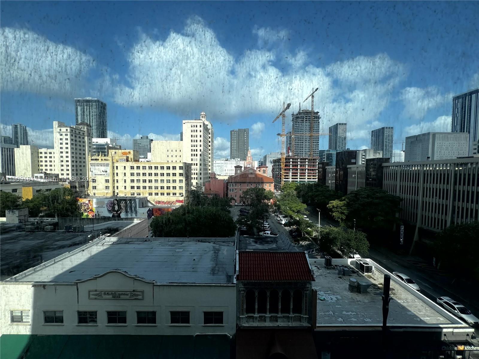 133 Northeast 2nd Avenue, Unit 617 Miami, FL 33132 - Photo 13 of 38 a view of multiple houses with a yard