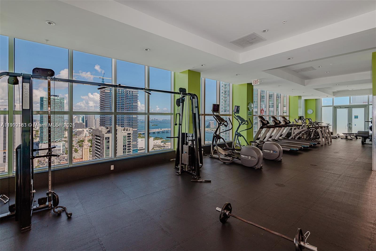 133 Northeast 2nd Avenue, Unit 617 Miami, FL 33132 - Photo 23 of 38 a view of a room with gym equipment