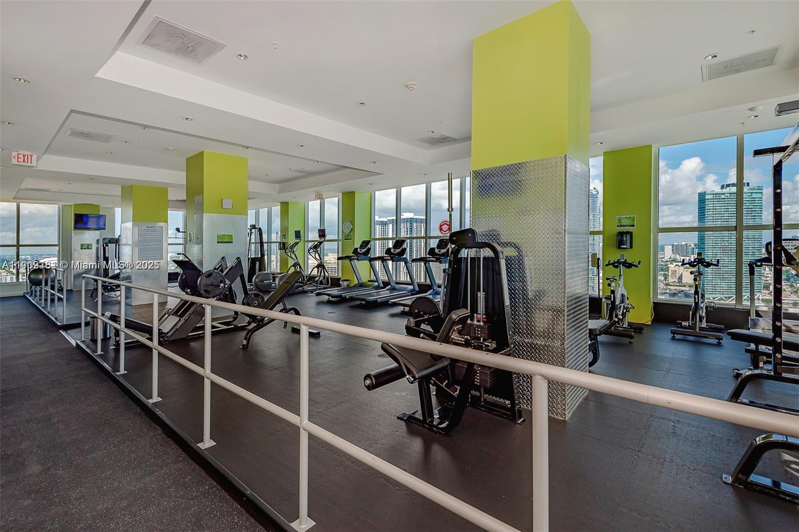 133 Northeast 2nd Avenue, Unit 617 Miami, FL 33132 - Photo 24 of 38 a view of a room with gym equipment