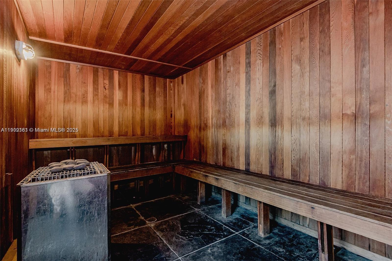 133 Northeast 2nd Avenue, Unit 617 Miami, FL 33132 - Photo 26 of 38 a bathroom with a shower and a curtain