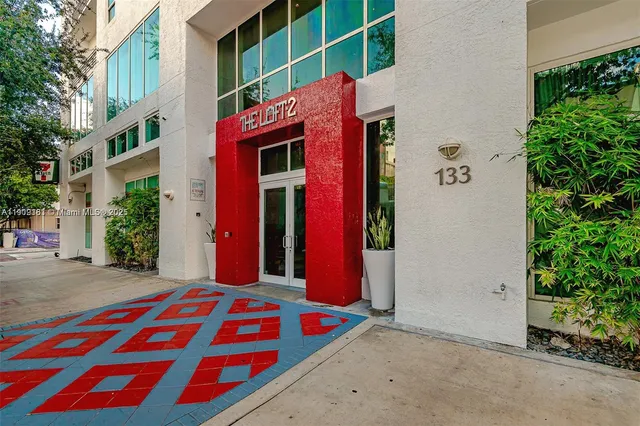 a view of elevator with hallway
