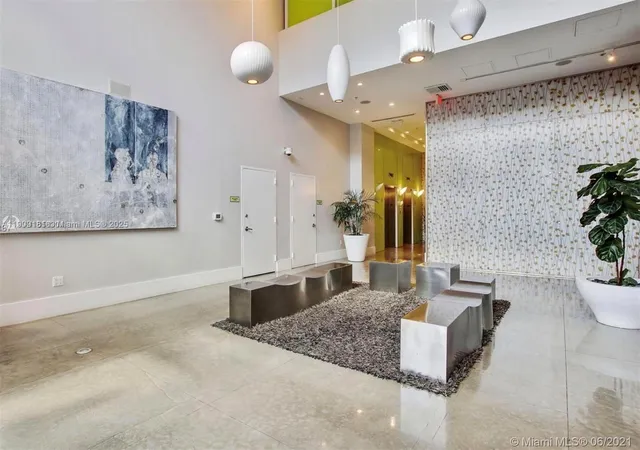 a kitchen with stainless steel appliances granite countertop a sink and a stove