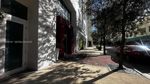 a view of a backyard with sitting area