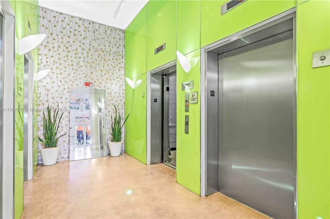 133 Northeast 2nd Avenue, Unit 617 Miami, FL 33132 - Photo 33 of 38 a view of elevator with hallway