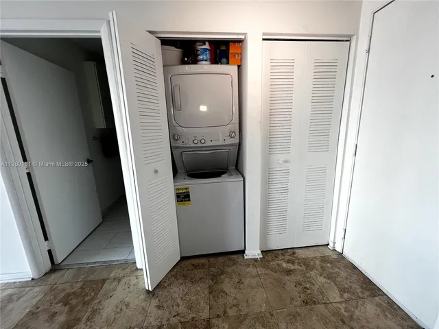 a view of a storage & utility room with a sink