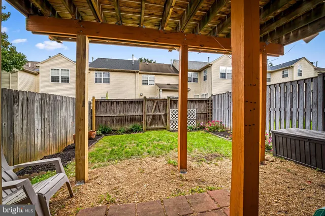 a house view with a backyard space